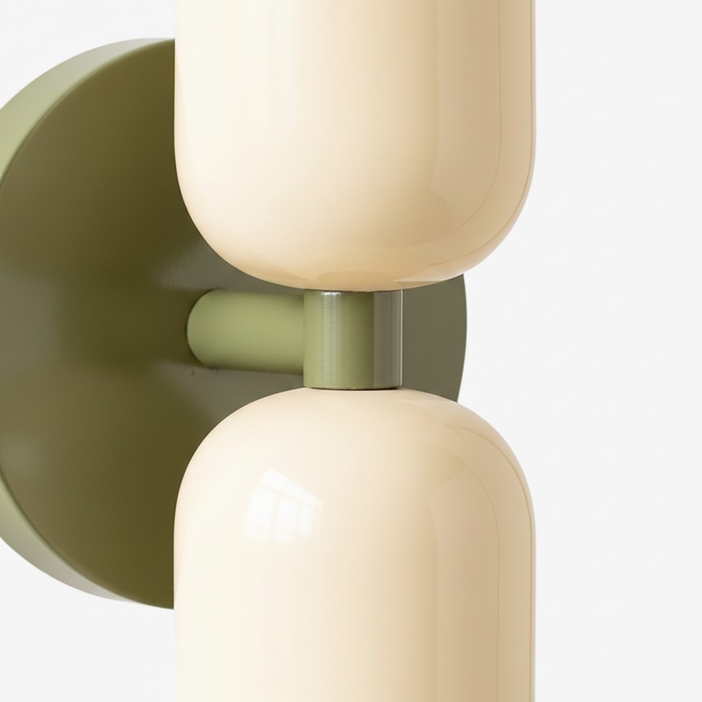 Short olive stem between two cream cylinders