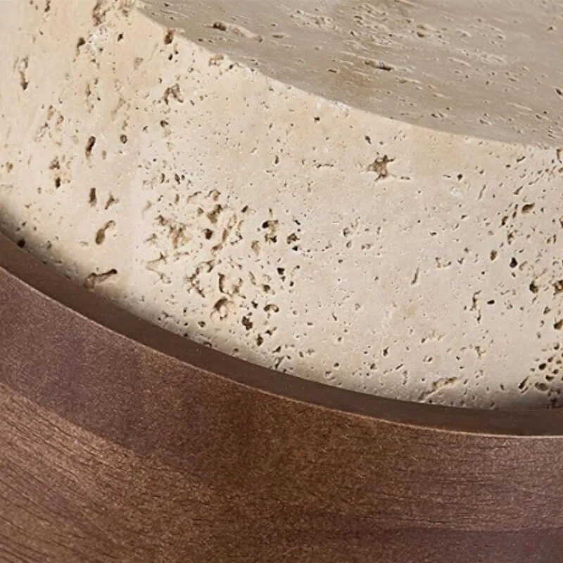 Travertine grain against the walnut ring