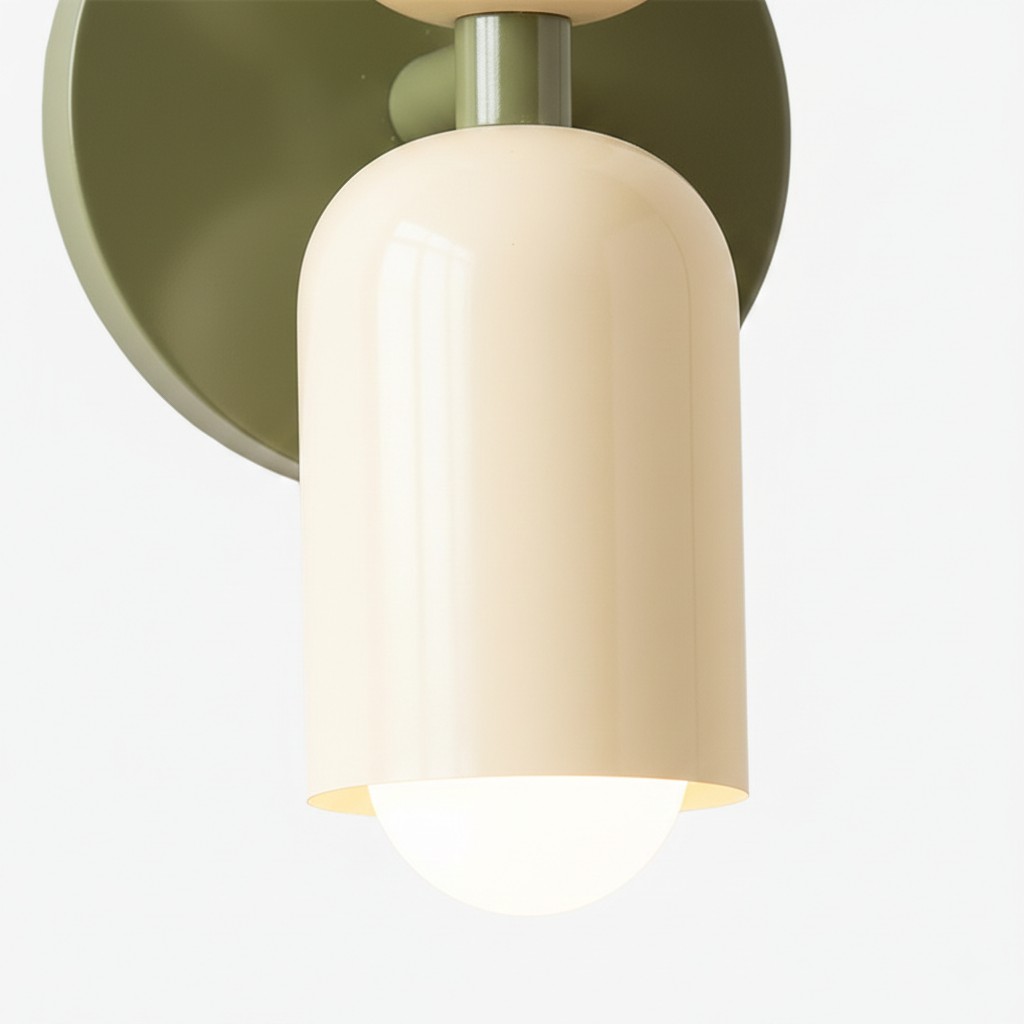 Cream cylinder and globe bulb on an olive canopy