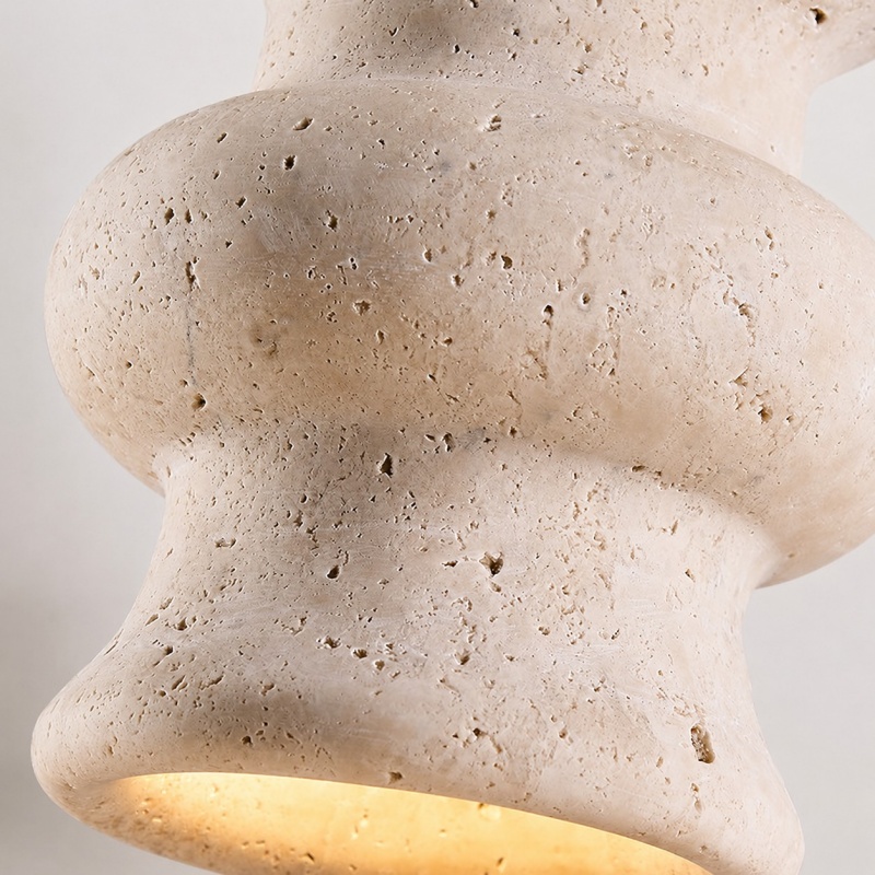Texture de pierre beige naturelle sur l'abat-jour suspendu