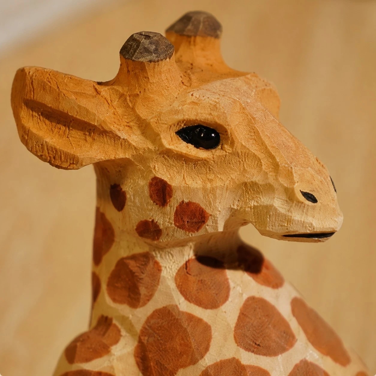 Wooden animal phone stand detail view