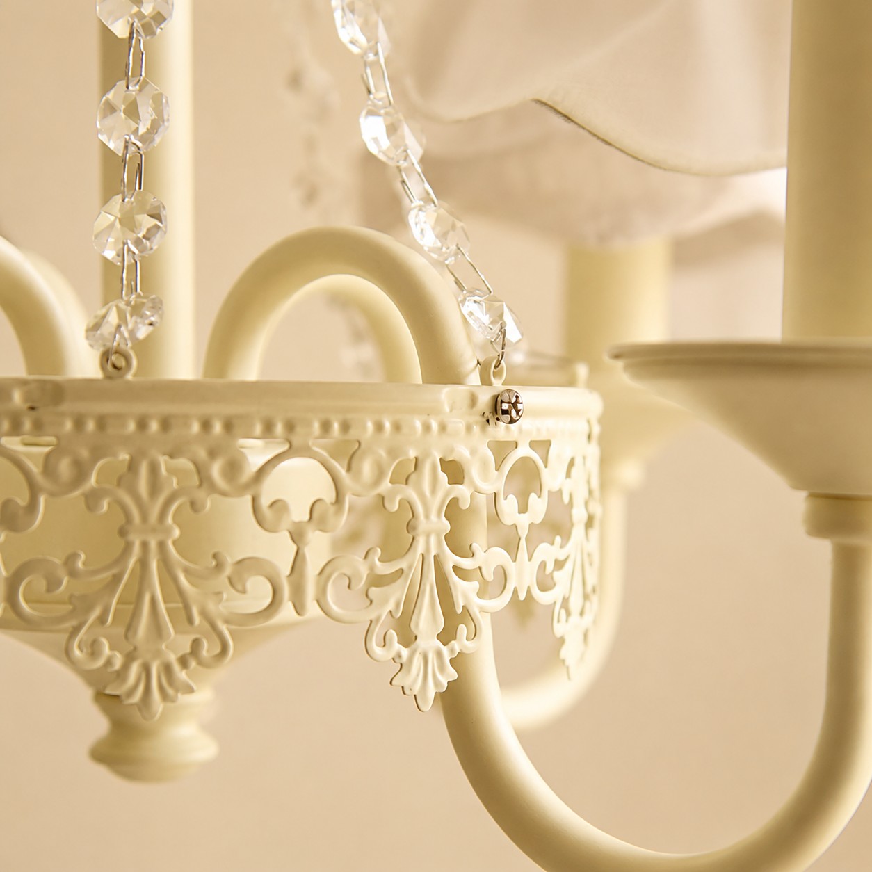 Close view of the decorative iron frame and hanging accents