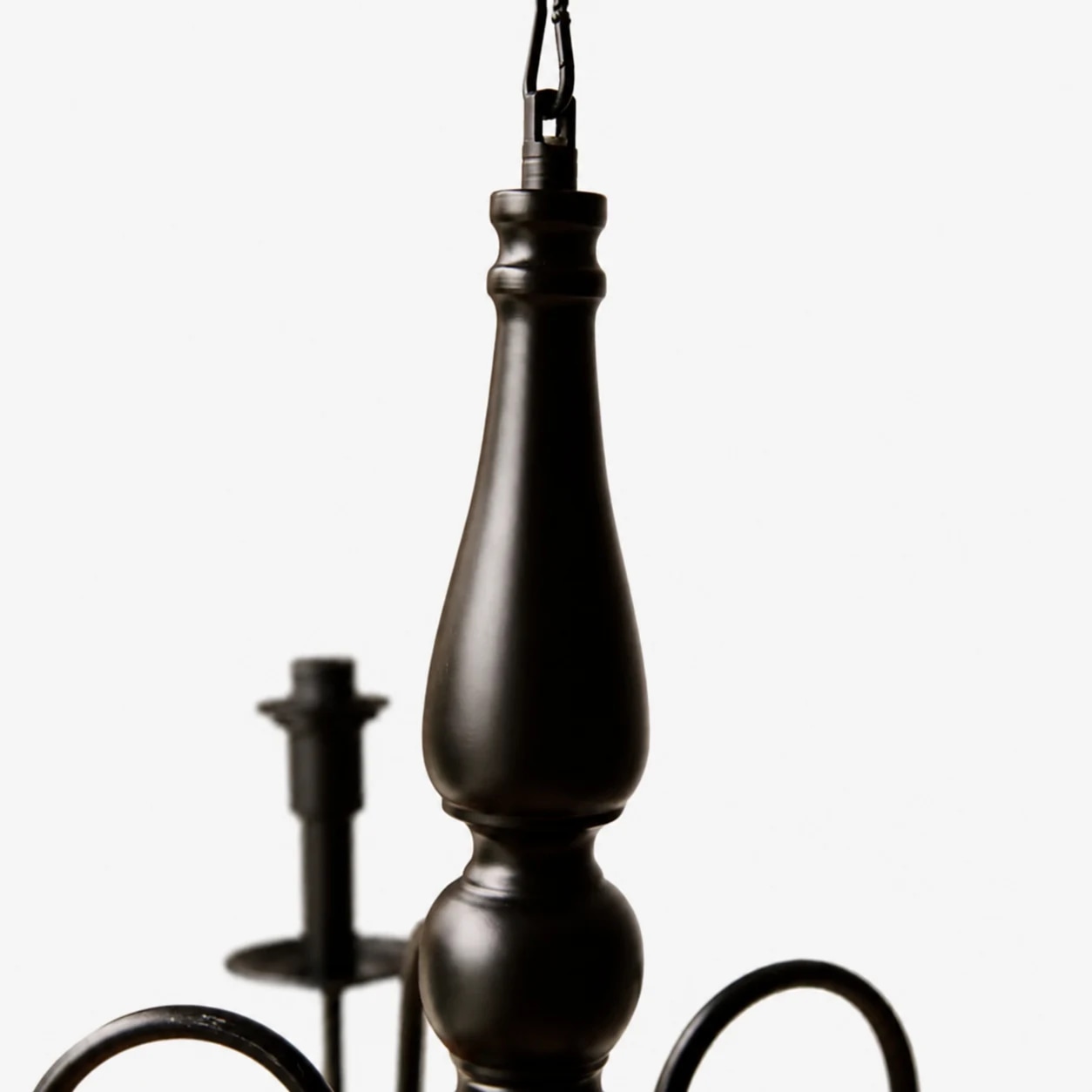 Turned black center column and hanging chain detail