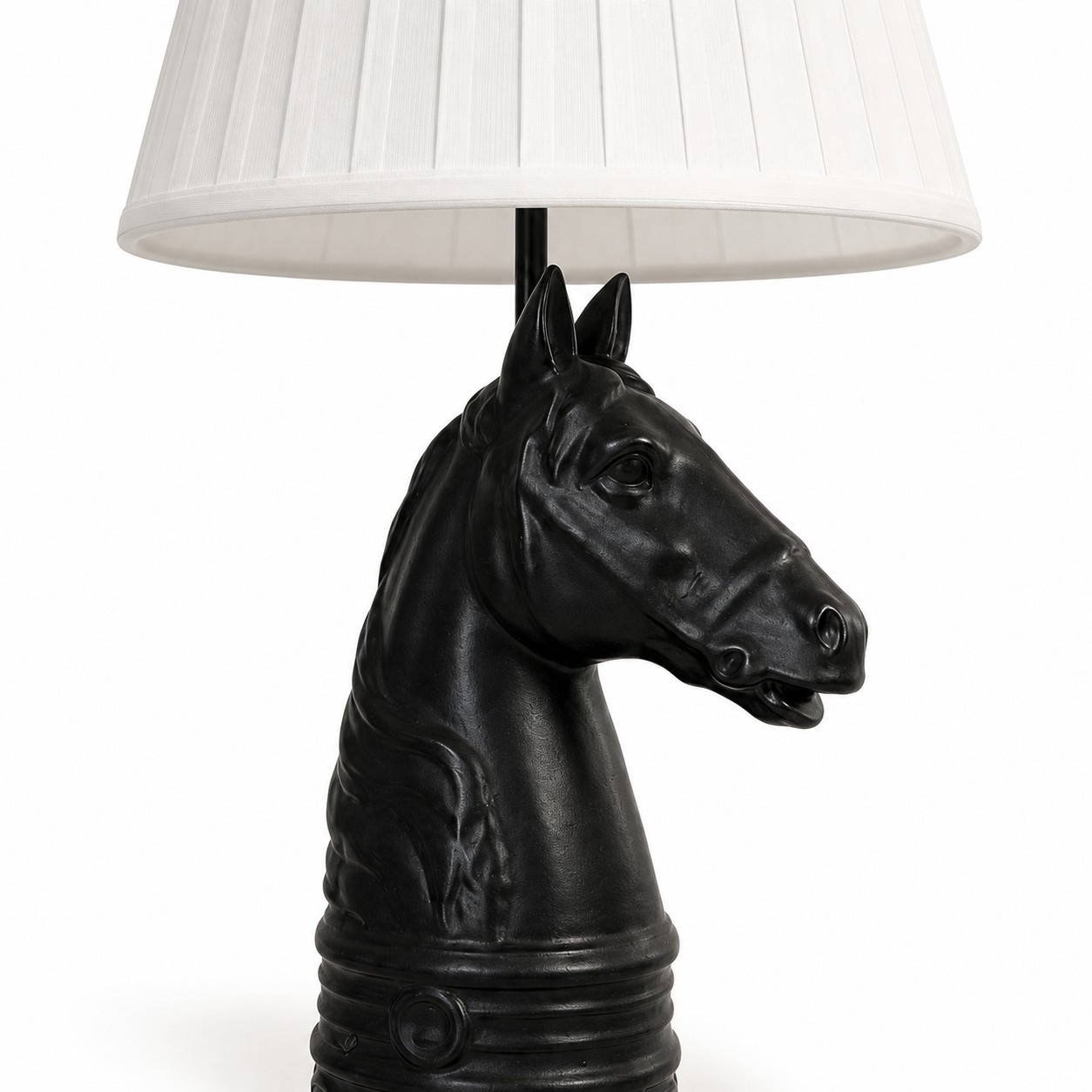 Close detail of black horse head lamp base