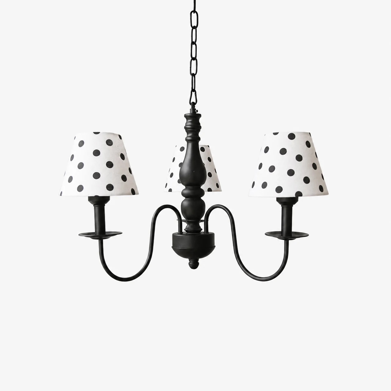 Three-light chandelier with sweeping black arms