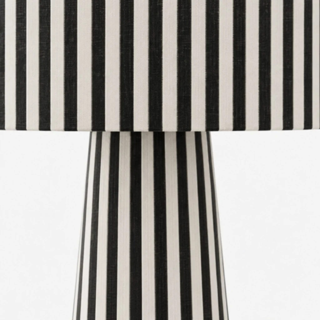 Close view of shade and base join on striped table lamp