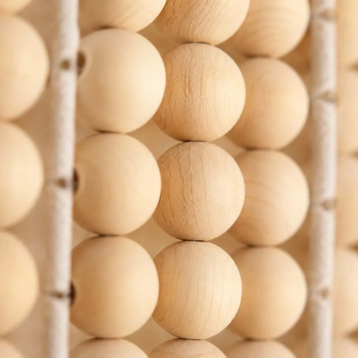 Natural wood bead texture close up