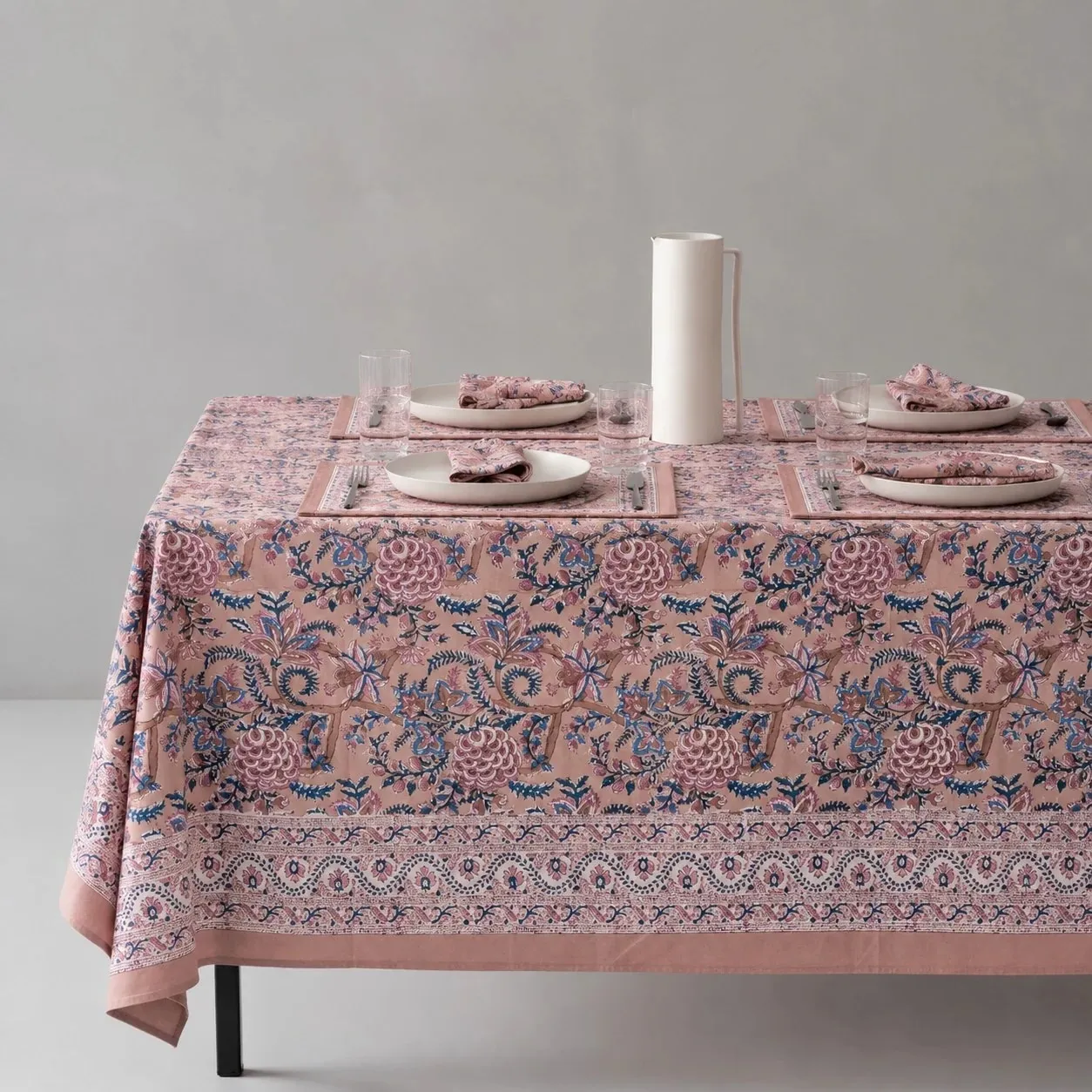 Rose mauve floral tablecloth on a dining table