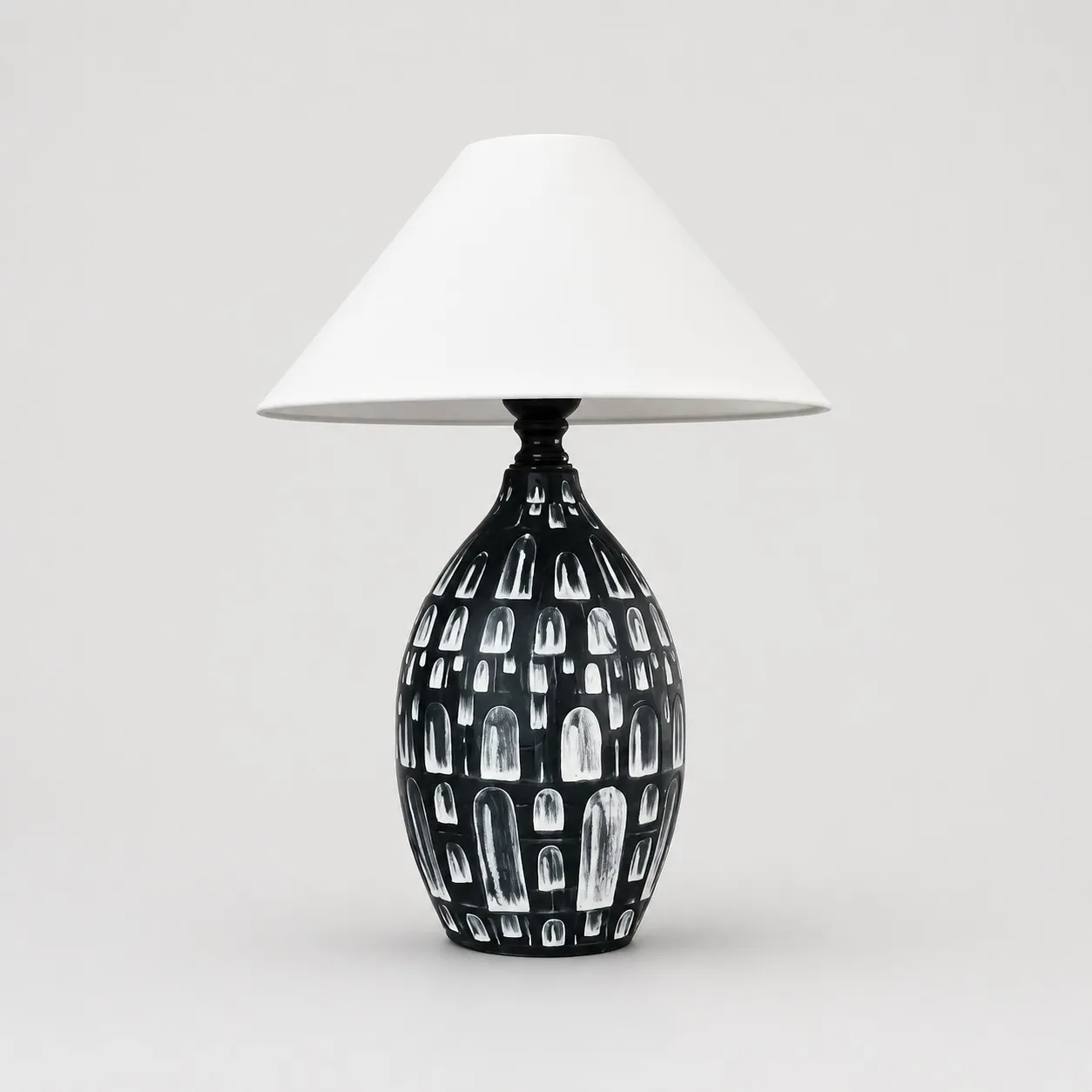 Black ceramic table lamp with white fabric shade front view