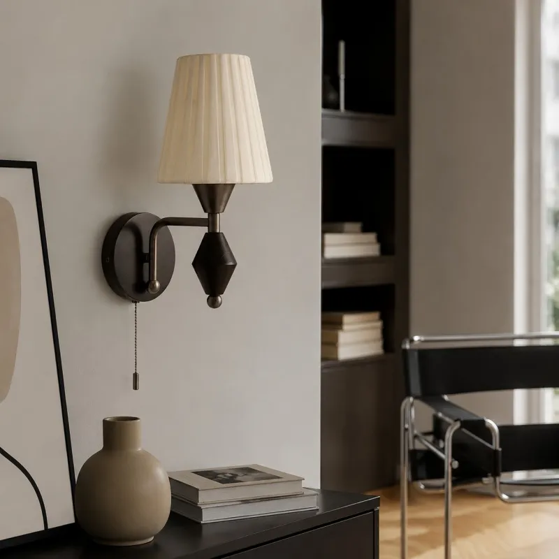 Console wall scene with matte nickel wall light