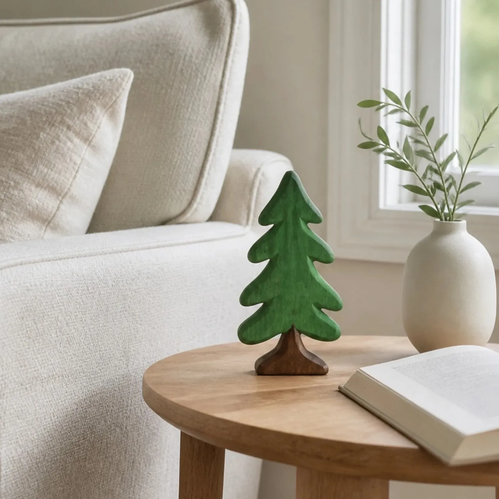 Green pine tree ornament on a coffee table