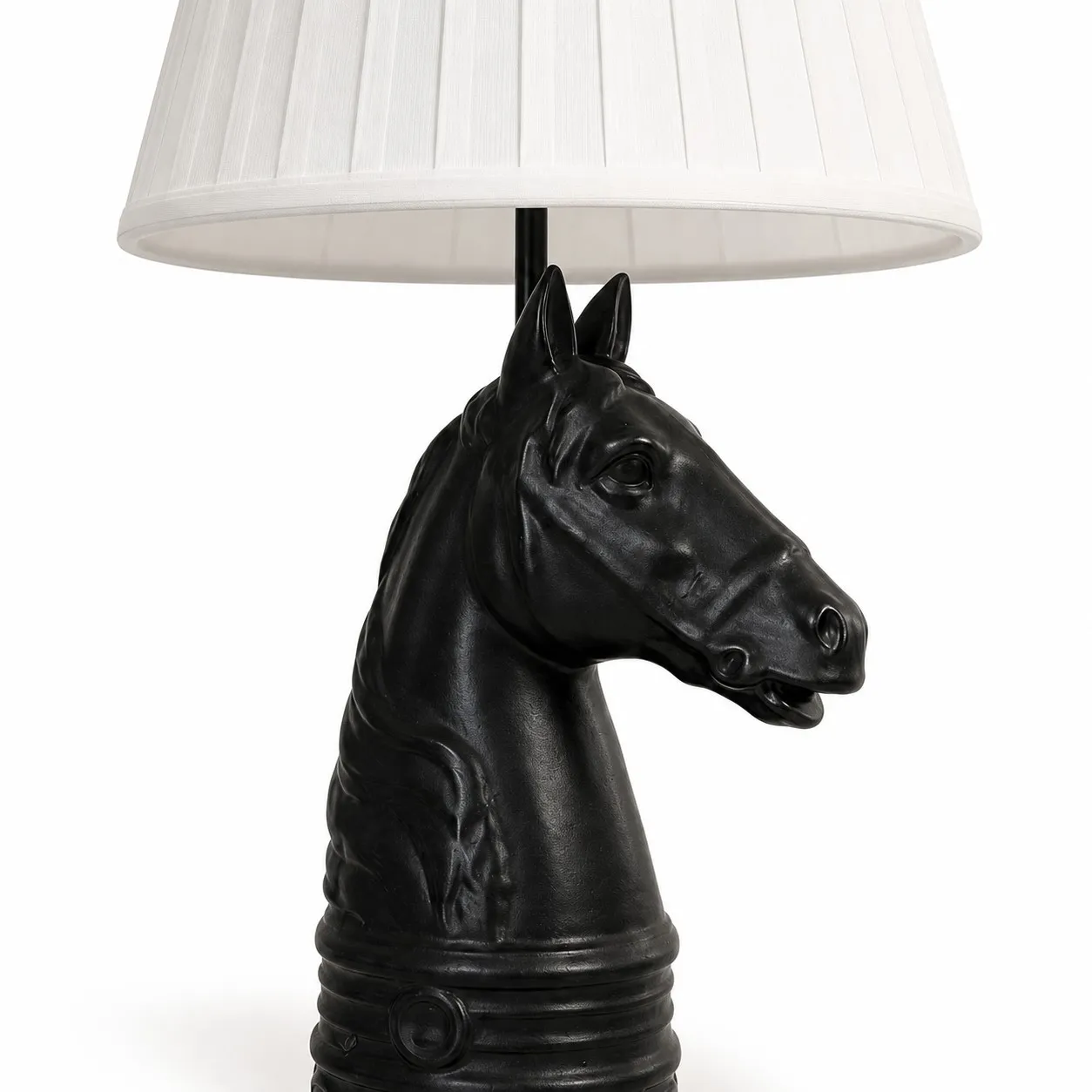 Close detail of black horse head table lamp base